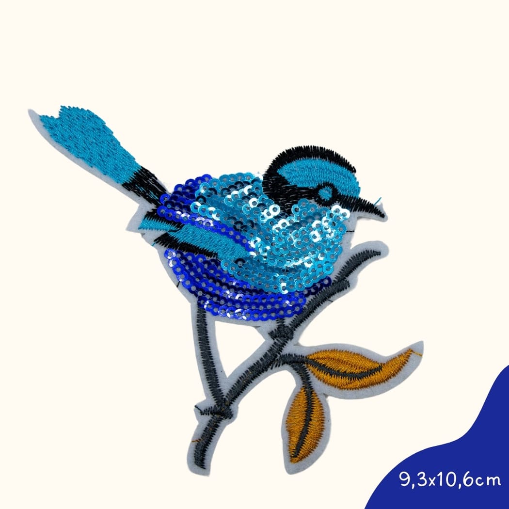 Bügelbild für Kinder von Funkey Monkey – schimmernder blauer Vogel mit glitzernden Pailletten, perfekt zur individuellen Gestaltung von Kleidung