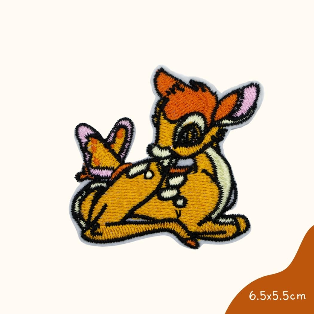 Funkey Monkey Bügelbild – Bambi Reh mit Schmetterling, ideal zur kreativen und zauberhaften Gestaltung von Kinderkleidung.