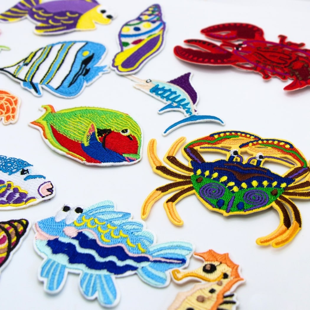Funkey Monkey Bügelbild – Fische, ideal zur kreativen und lustigen Gestaltung von Kinderkleidung mit einem einzigartigen Fischdesign.